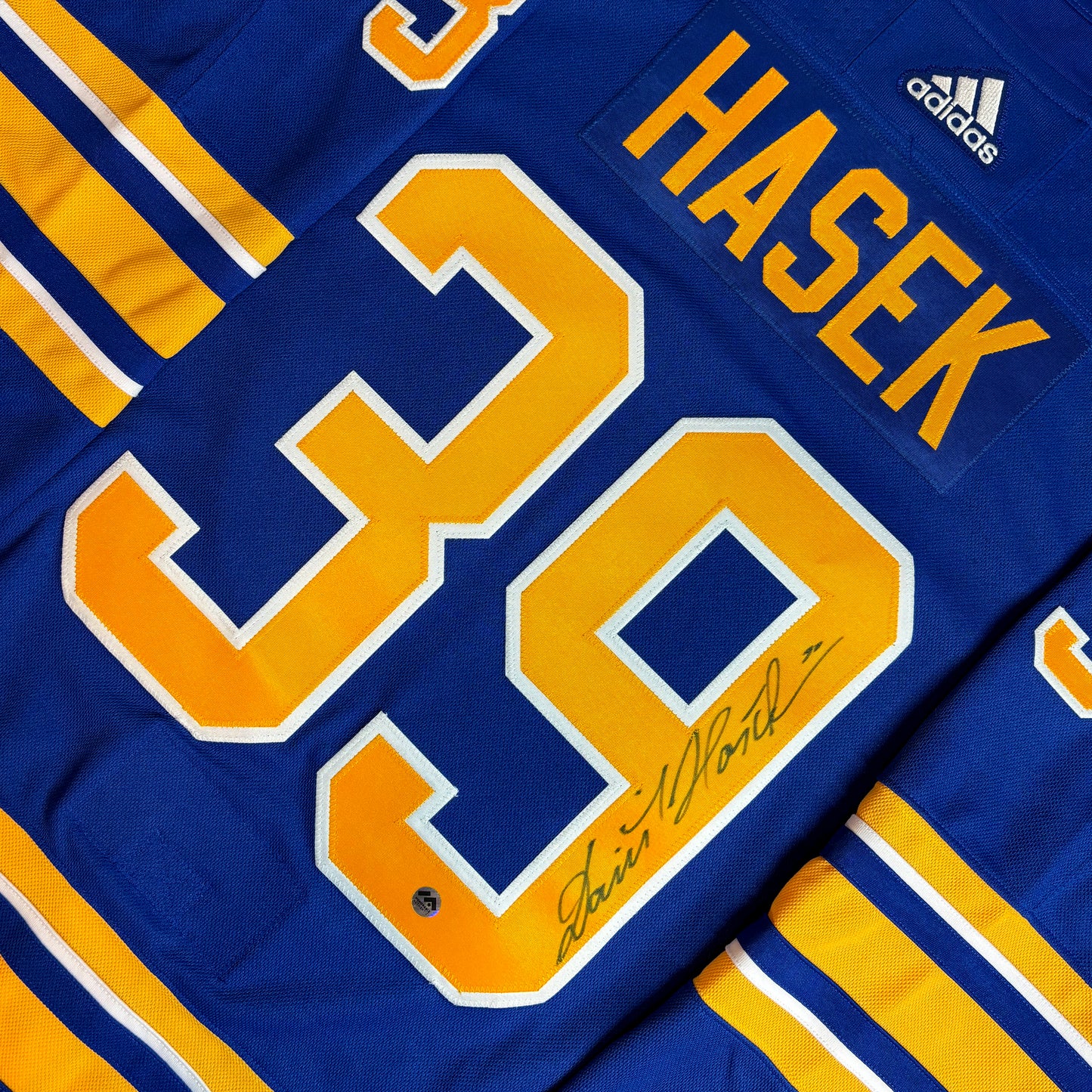 DOMINIK HASEK - AUTOGRAPHED HOCKEY JERSEY - ADIDAS